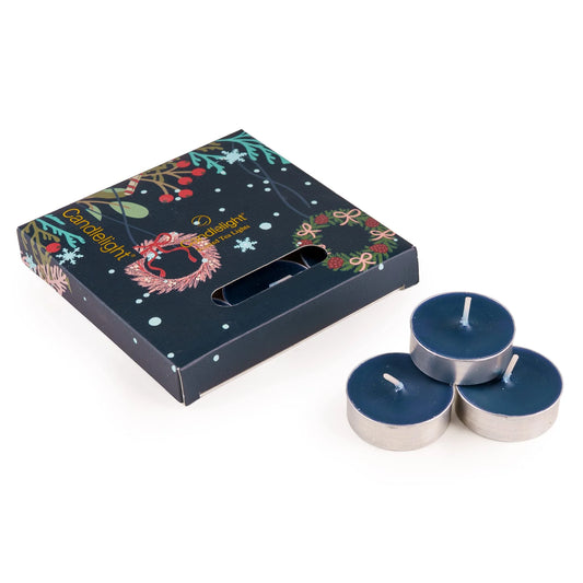 Candlelight Festive Florals Trees in Blue set of 9 scented tealights shown beside their dark blue illustrated presentation box