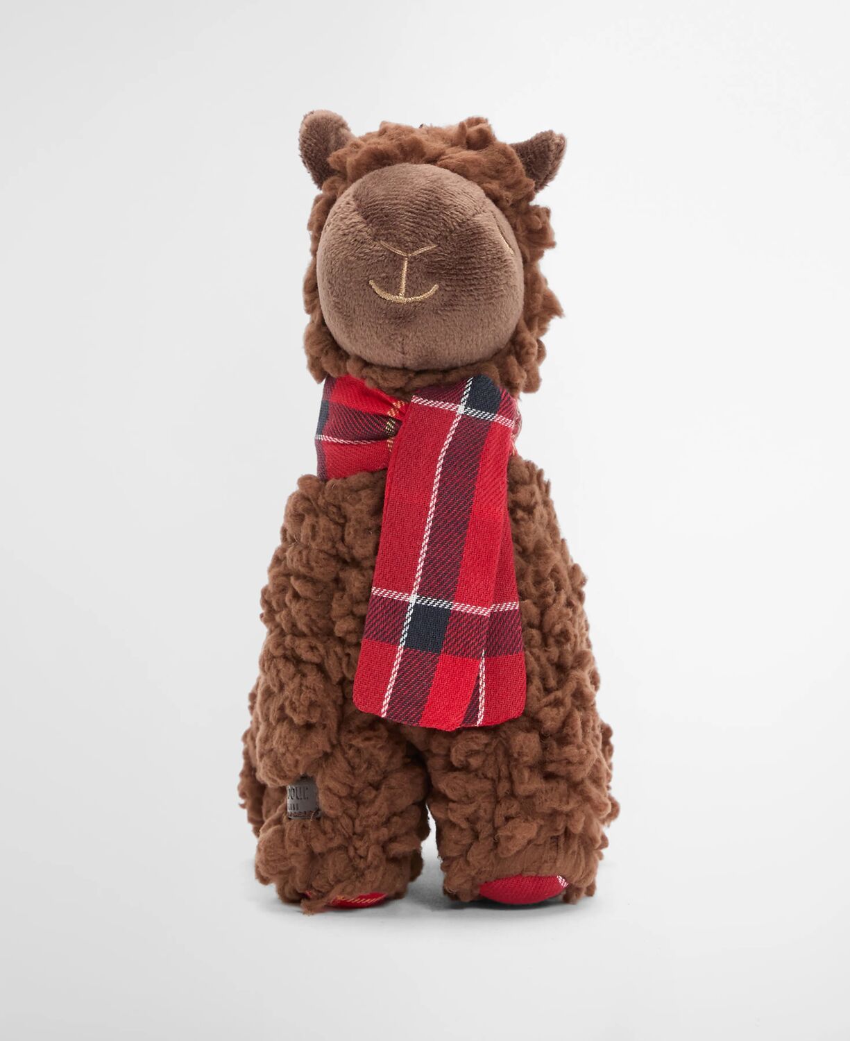 Brown plush Barbour Christmas Llama Dog Toy featuring classic Barbour tartan ears, a matching scarf and an embossed logo badge.