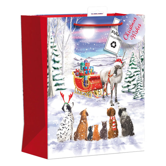Design Group XL Christmas Pets Gift Bag featuring dogs, cats, and a reindeer sleigh in a snowy landscape