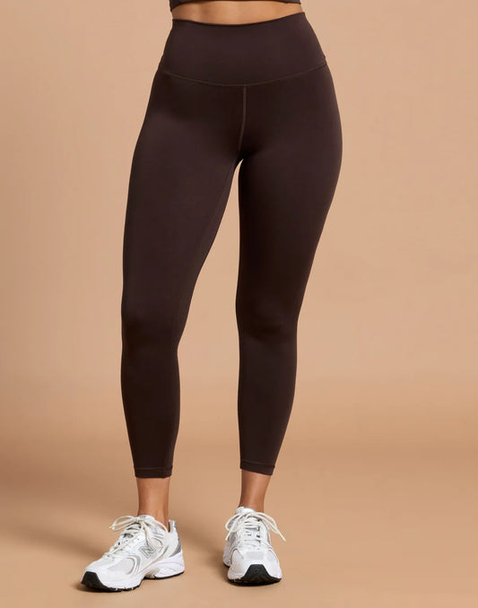 Front view of the Gym + Coffee Day Kind 7/8 Legging featuring a high-rise waistband and smooth finish in Mocha Brown.