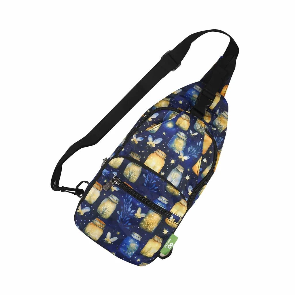Eco Chic lightweight foldable crossbody sling bag featuring glowing jars and fireflies pattern on navy blue fabric