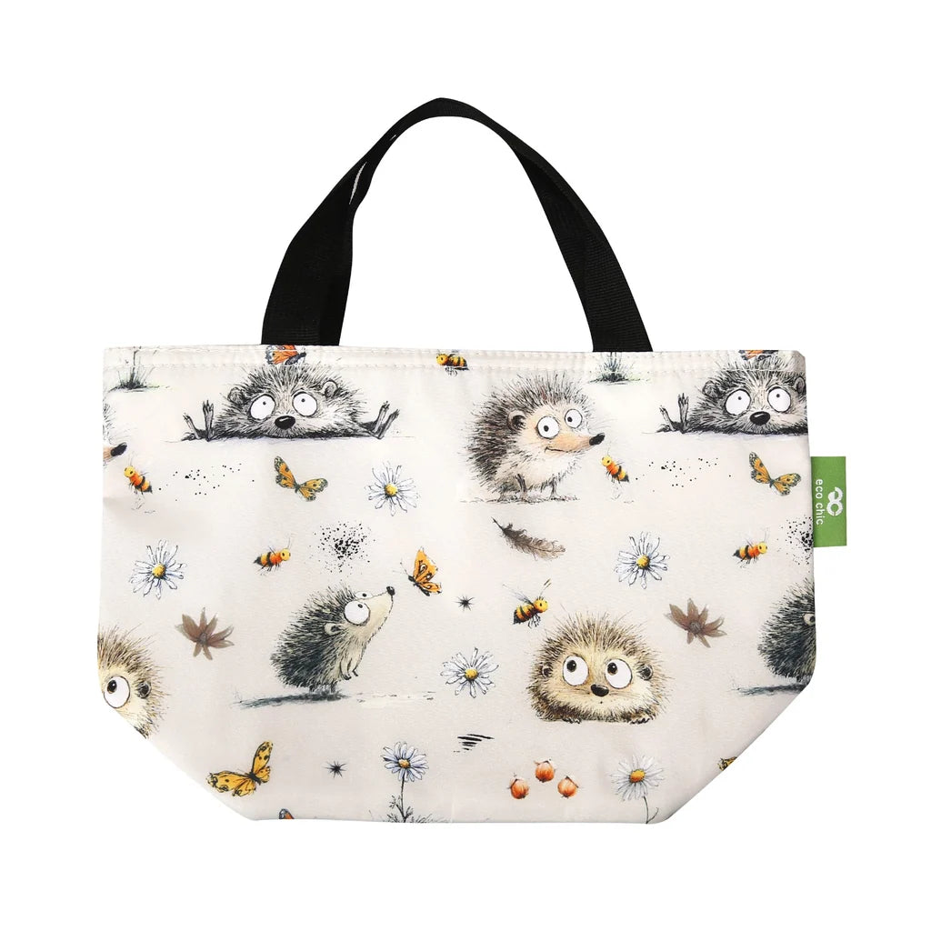Eco Chic lightweight foldable insulated lunch bag featuring illustrated Whimsy Hedgehogs print with bees and daisies