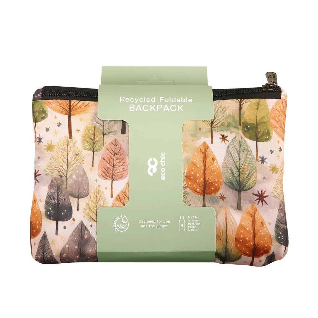 Eco Chic lightweight foldable backpack featuring illustrated Rhythm of Trees pattern in warm autumnal tones