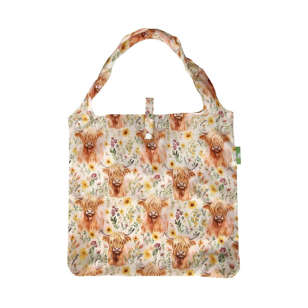 Eco Chic lightweight foldable reusable shopping bag featuring illustrated Floral Highland Cow and wildflower pattern