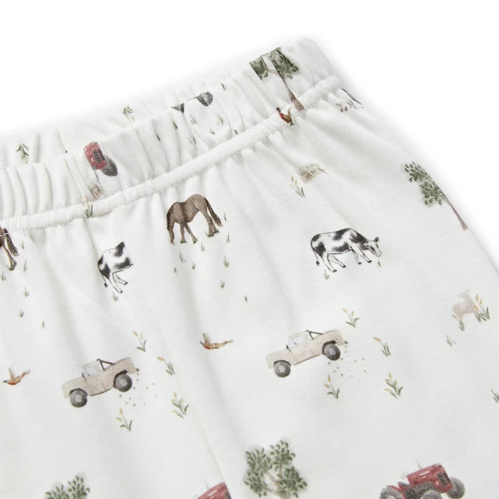 Eleanor Charles On The Farm print organic cotton pyjamas featuring red tractors and farm animals