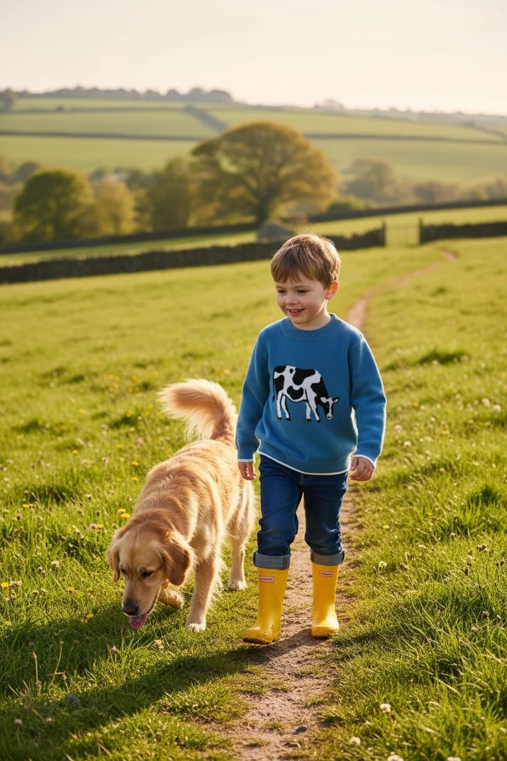 eleanor charles blue jumper with cow design on front