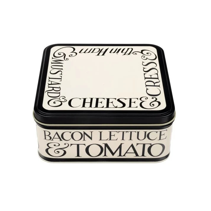 Cream square Emma Bridgewater Black Toast storage tin with black lettering around the edges.