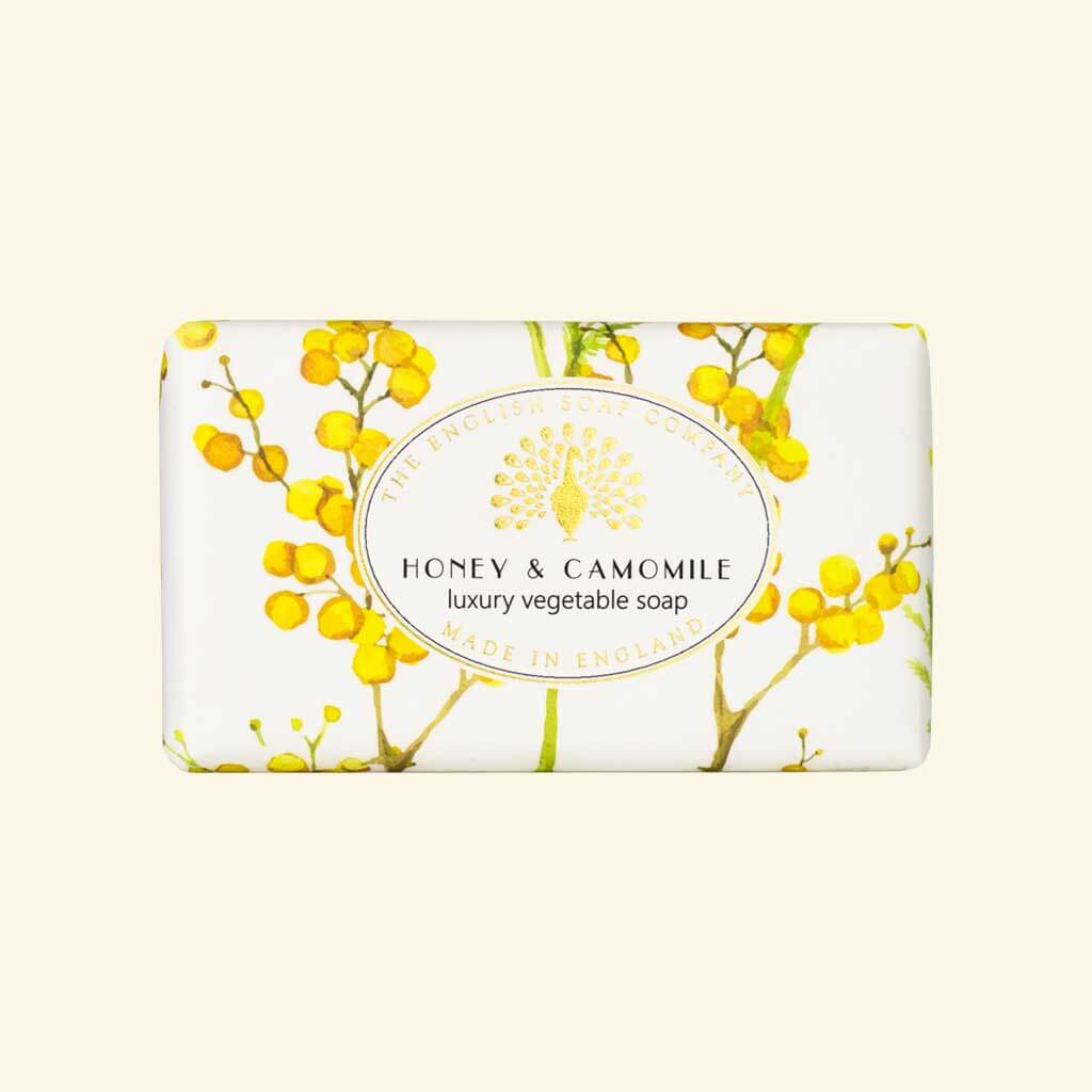 The English Soap Company Vintage Honey and Camomile 190g soap bar wrapped in recyclable paper with yellow floral artwork