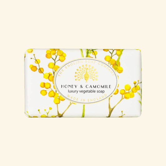 The English Soap Company Vintage Honey and Camomile 190g soap bar wrapped in recyclable paper with yellow floral artwork