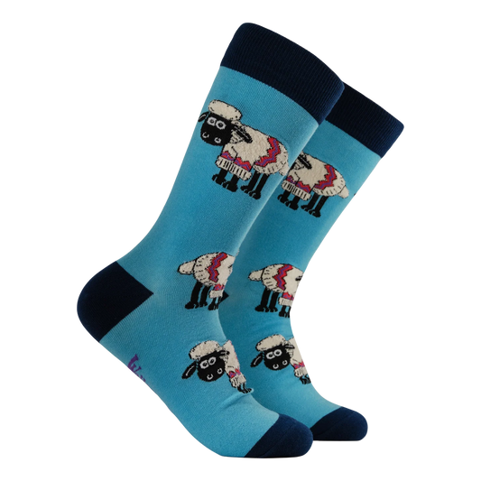 Socktopus Fluffy Shaun the Sheep socks featuring textured Shaun the Sheep motifs on a light blue background with navy cuffs