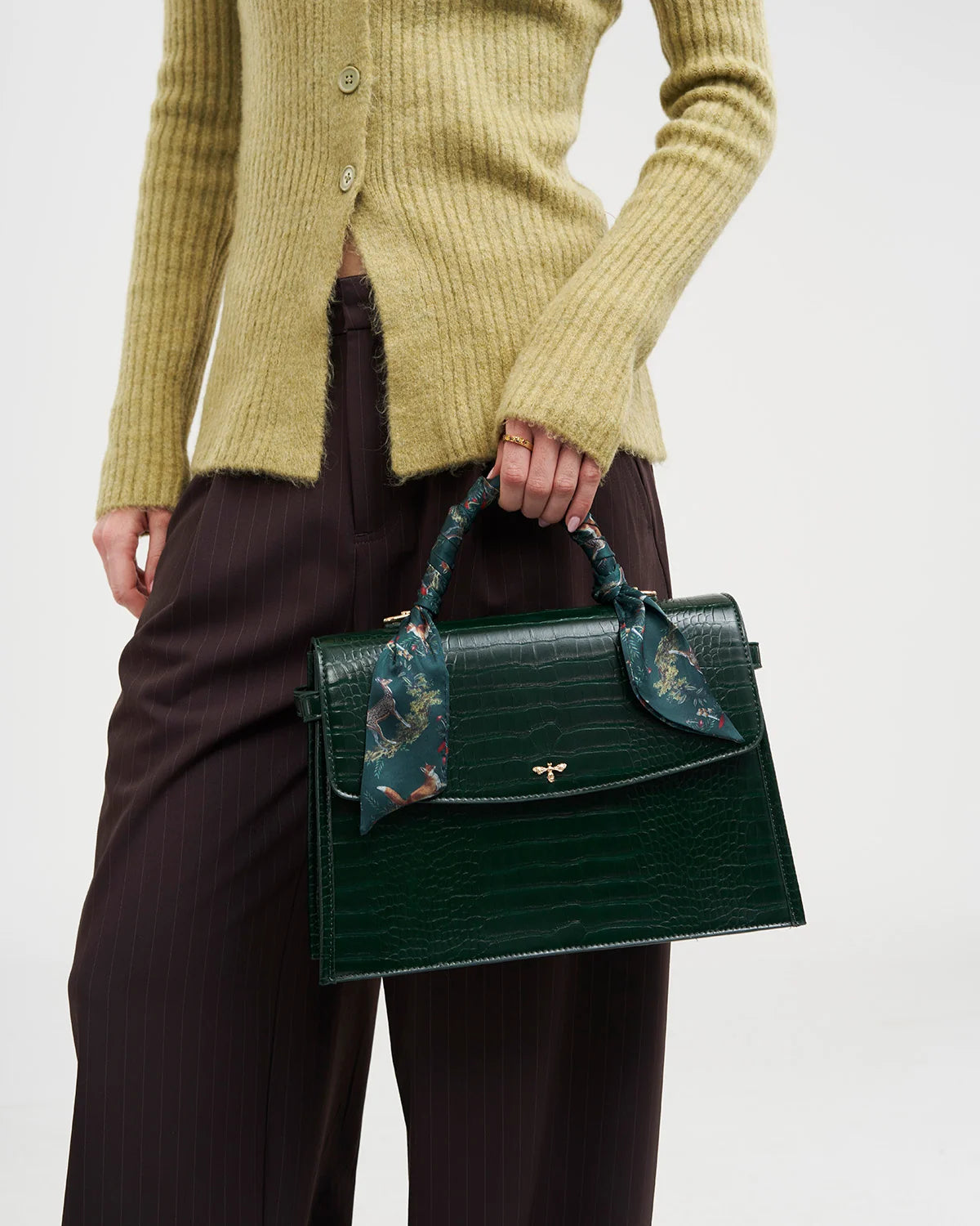 Fable Eliza Top Handle Bag in Forest Green Croc with Into the Woods printed scarf wrapped around the handle