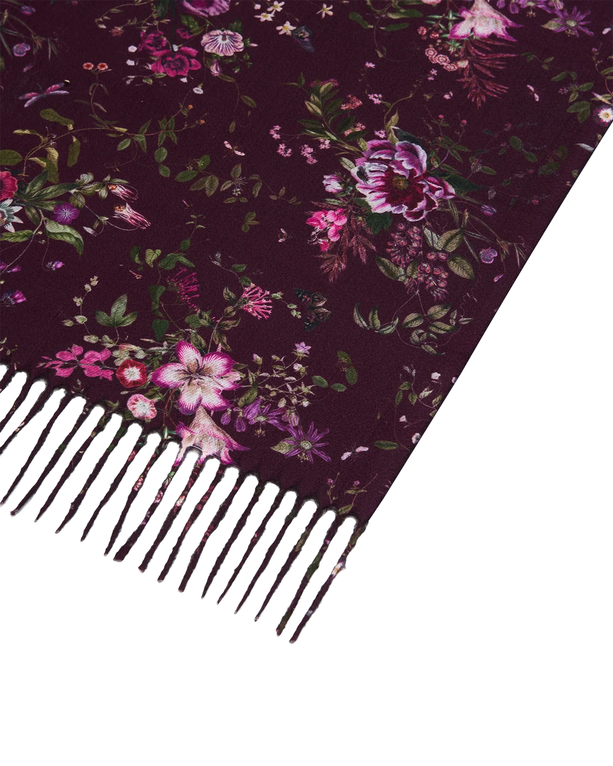 Fable Eve Floral Fringed Scarf in Burgundy wrapped around model's neck featuring floral print and long fringe detail