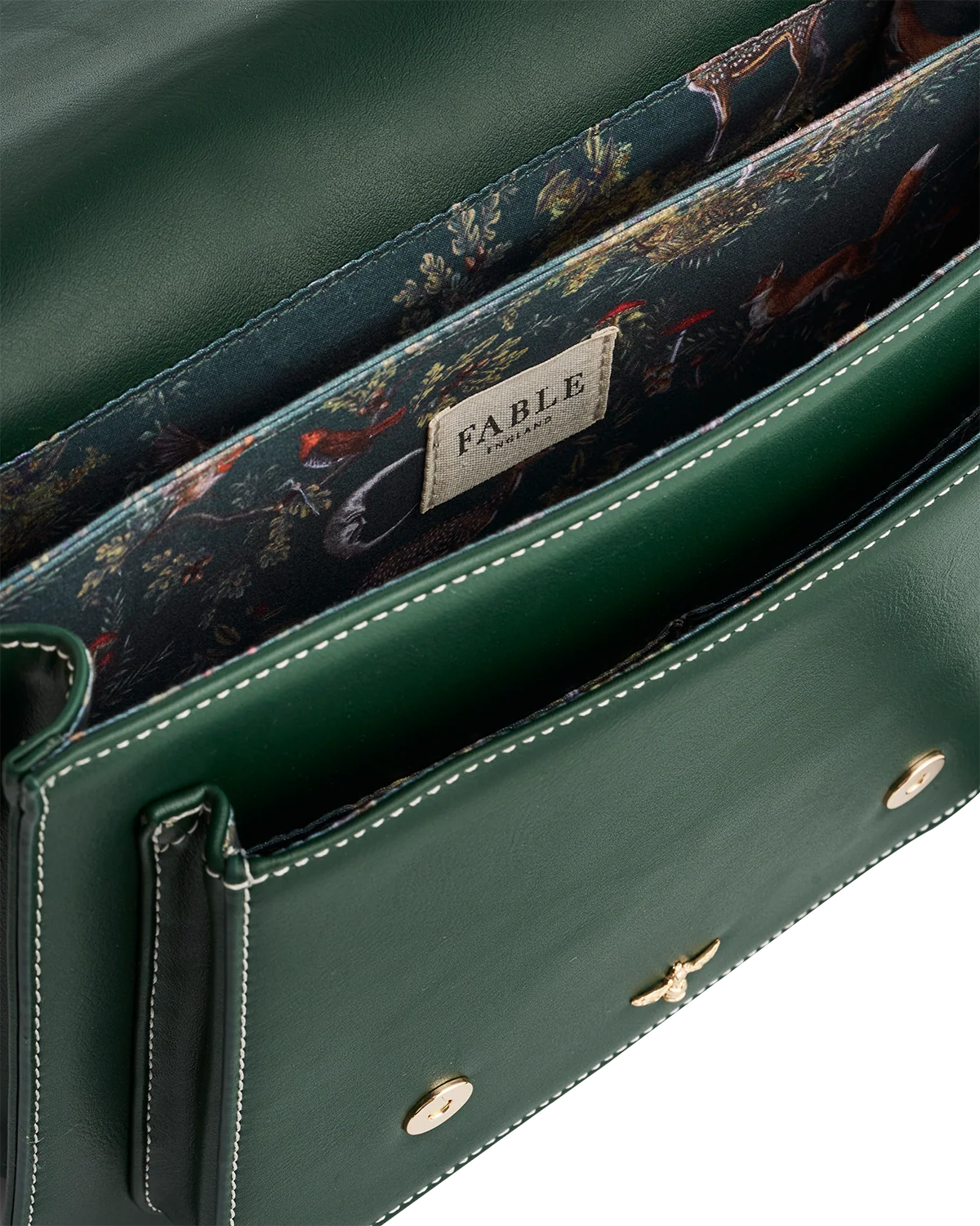 Fable Into the Woods Satchel Bag in green faux leather featuring gold bee plaque and adjustable cross-body strap