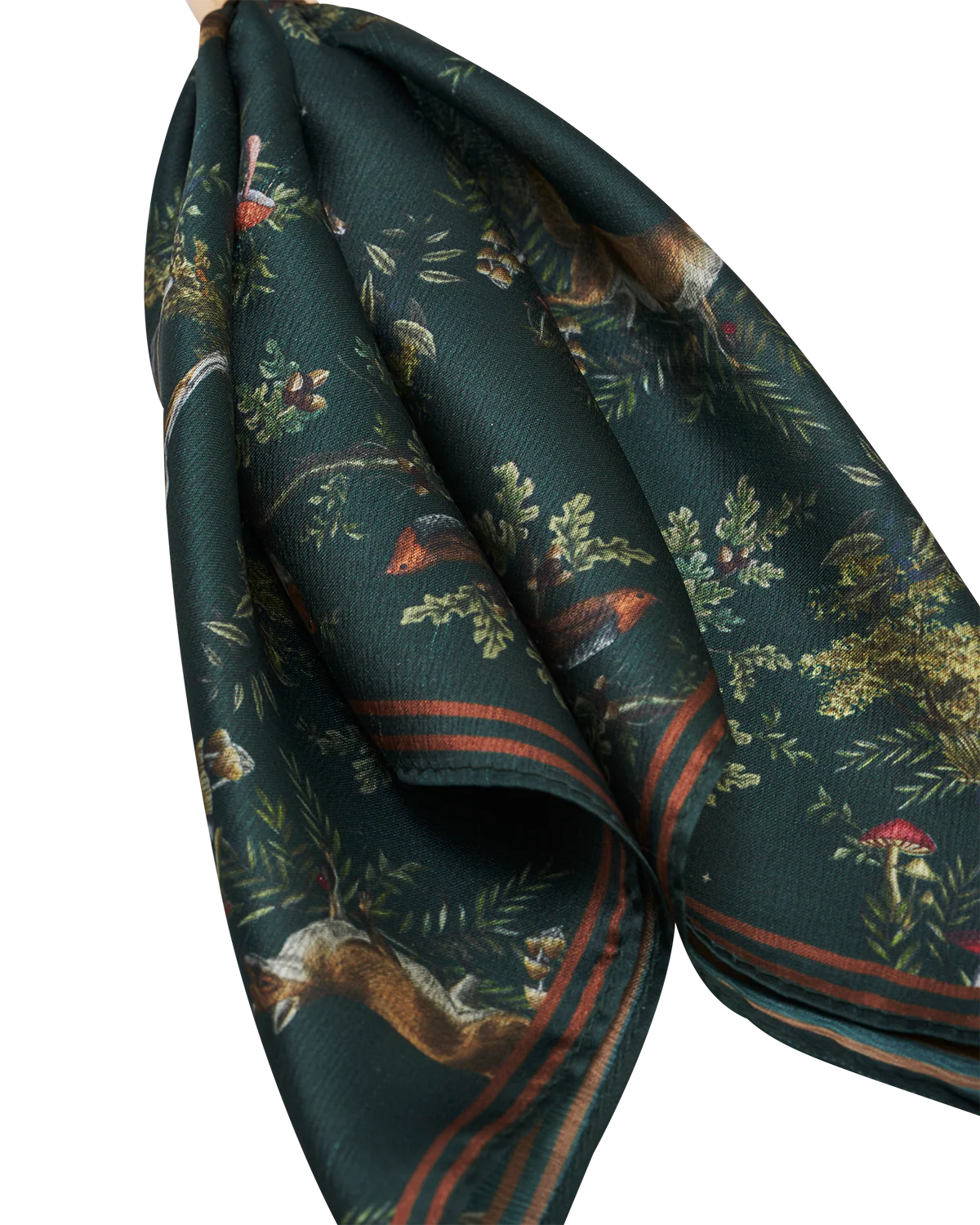 Fable Into the Woods Scarf Bag Charm attached to a brown leather handbag showing gold clip and printed scarf