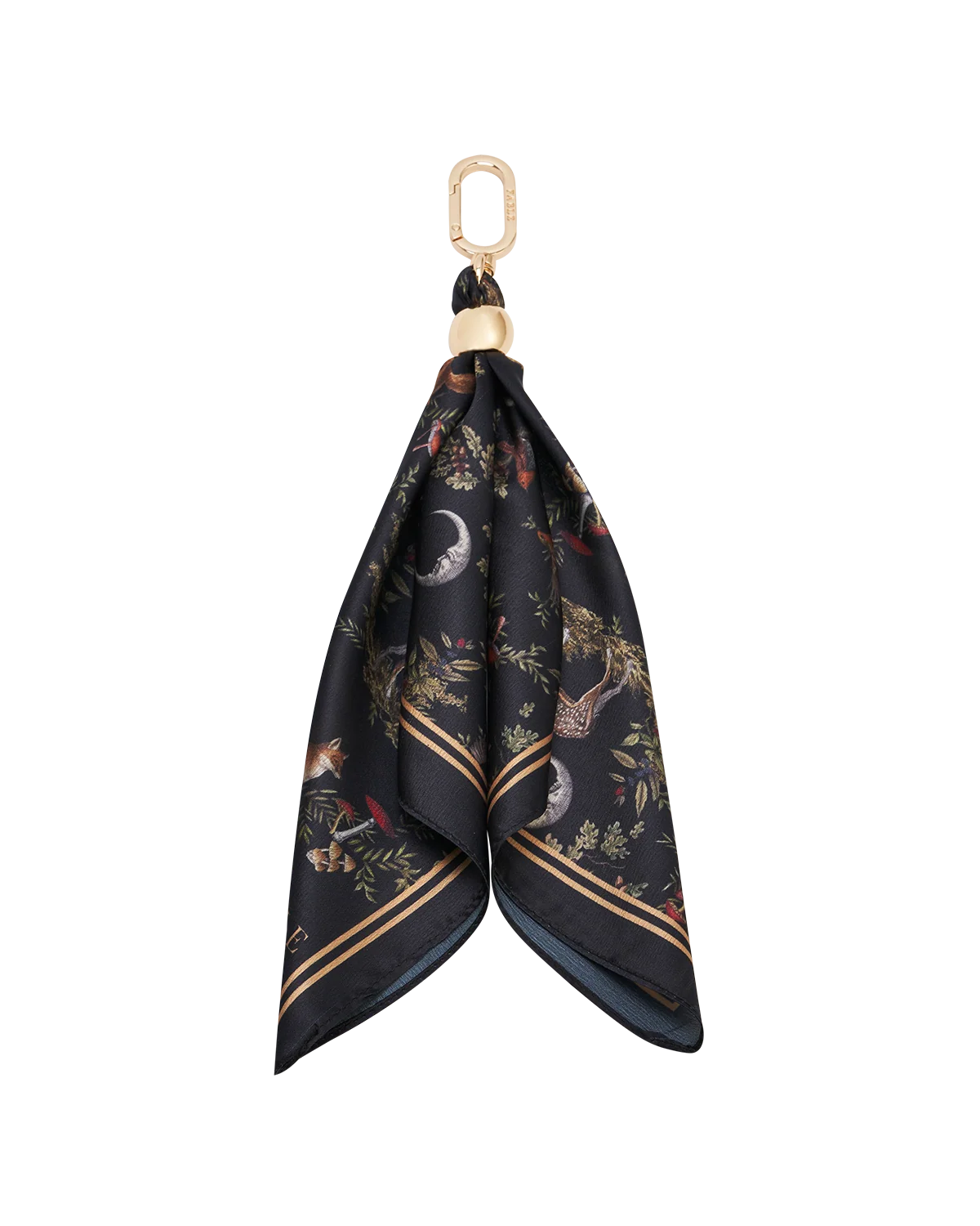 Fable Into the Woods Scarf Bag Charm attached to a brown leather handbag showing gold clip and printed scarf