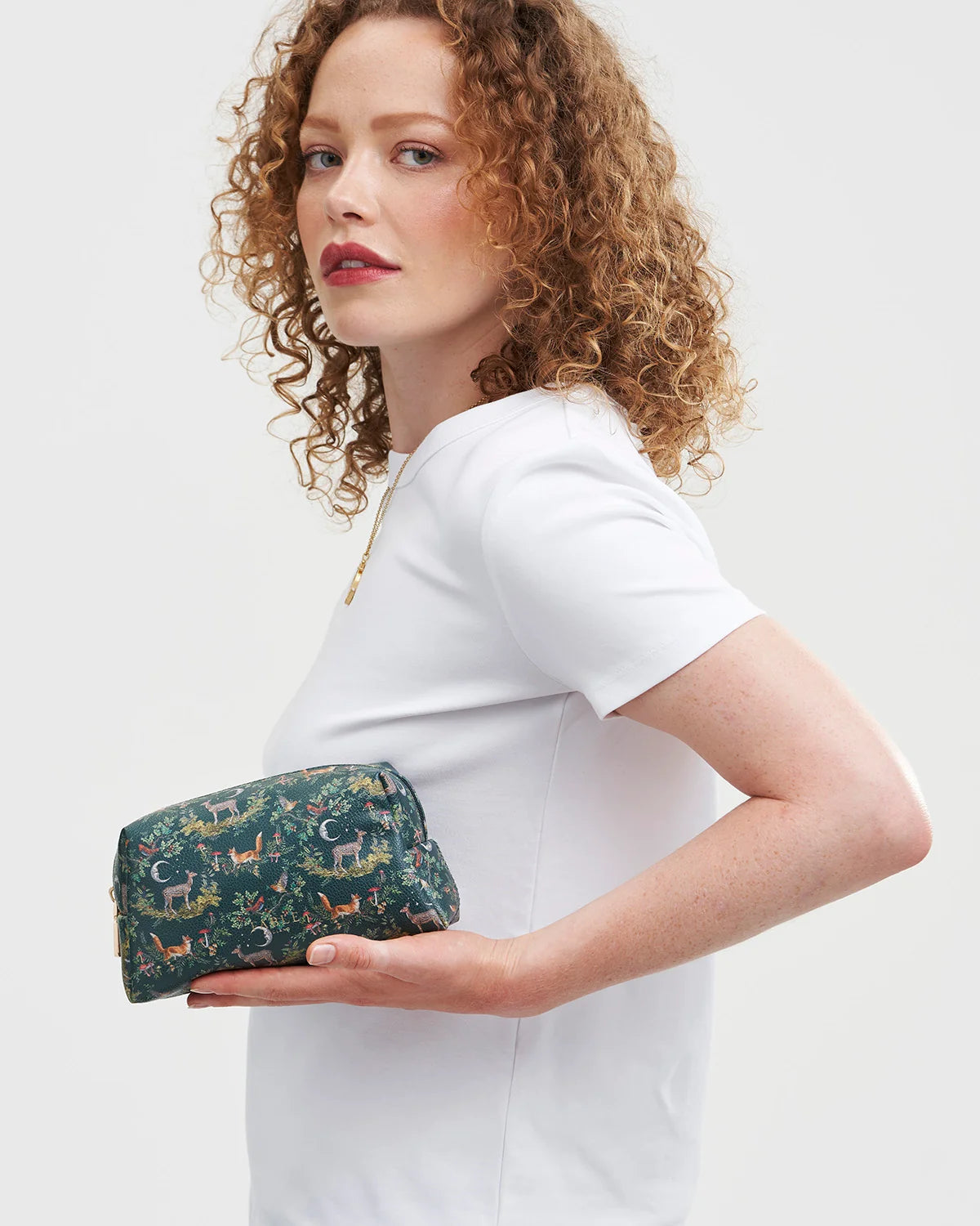 Fable Into the Woods Small Cosmetic Pouch in woodland green faux leather with printed fox and deer design