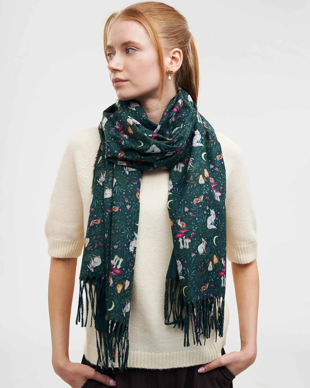 Fable Niva Long Fringed Scarf in forest green featuring Catherine Rowe storybook illustrative design