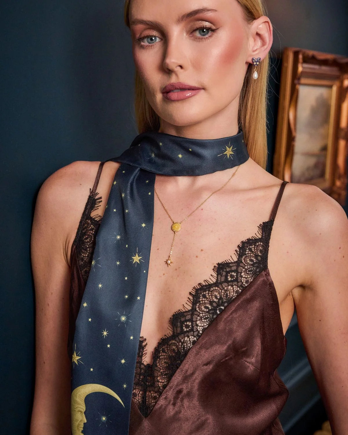 Fable Selene Skinny Scarf in Navy showing wildflower and celestial moon prints