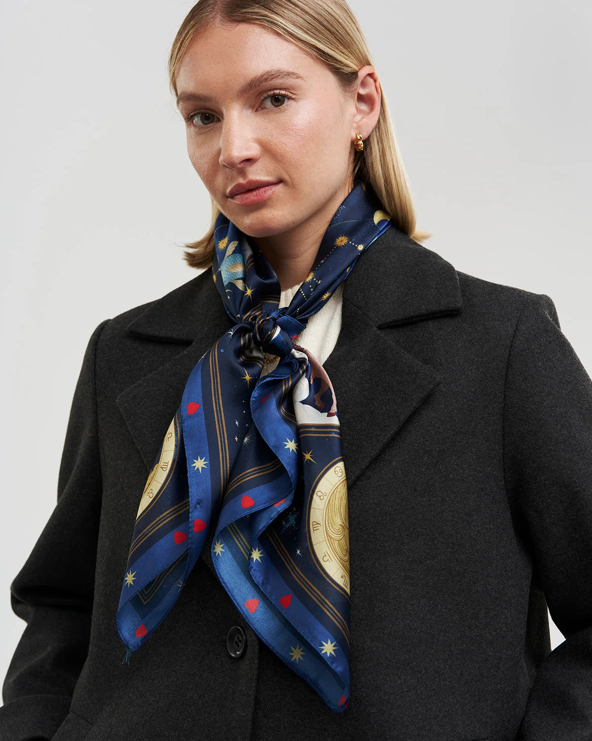Fable Zodiac Square Scarf in Navy featuring illustrated zodiac signs and celestial sun artwork