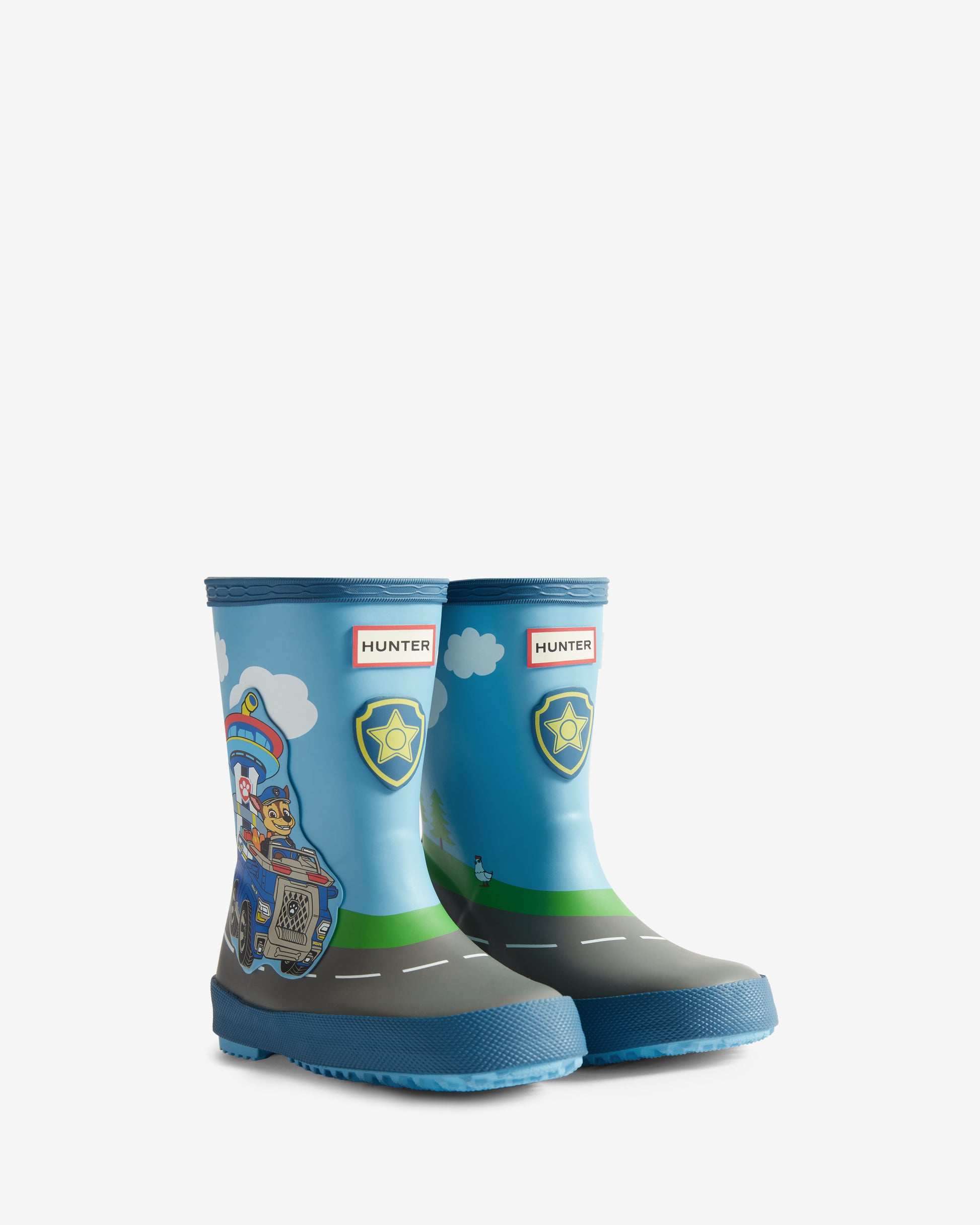 Hunter Paw Patrol Chase Kids First Wellington Boots in Borealis Blue featuring a Chase the pup graphic and a textured blue grip sole.
