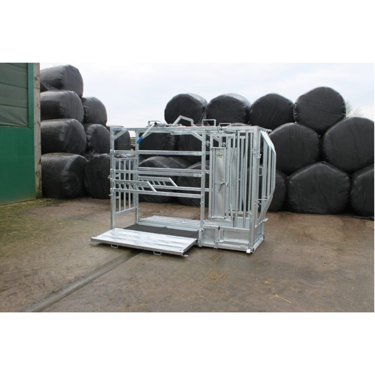 Heavy duty galvanised IAE Crusader Plus cattle crush with manual yoke and side access doors for farm stock handling