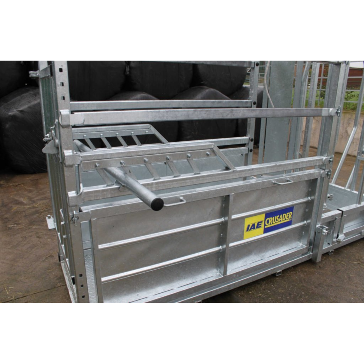 Heavy duty galvanised IAE Crusader Plus cattle crush with manual yoke and side access doors for farm stock handling