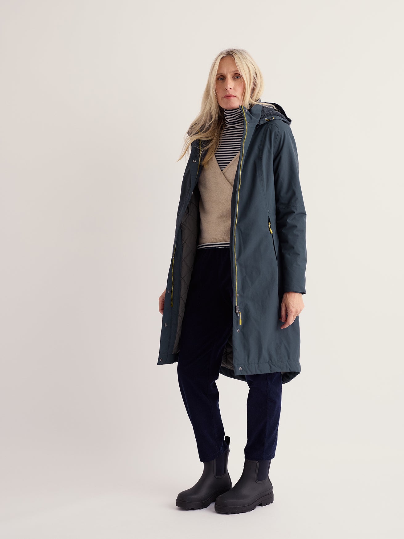 Seasalt Women's Janelle Waterproof Raincoat in a relaxed fit featuring a peaked hood.