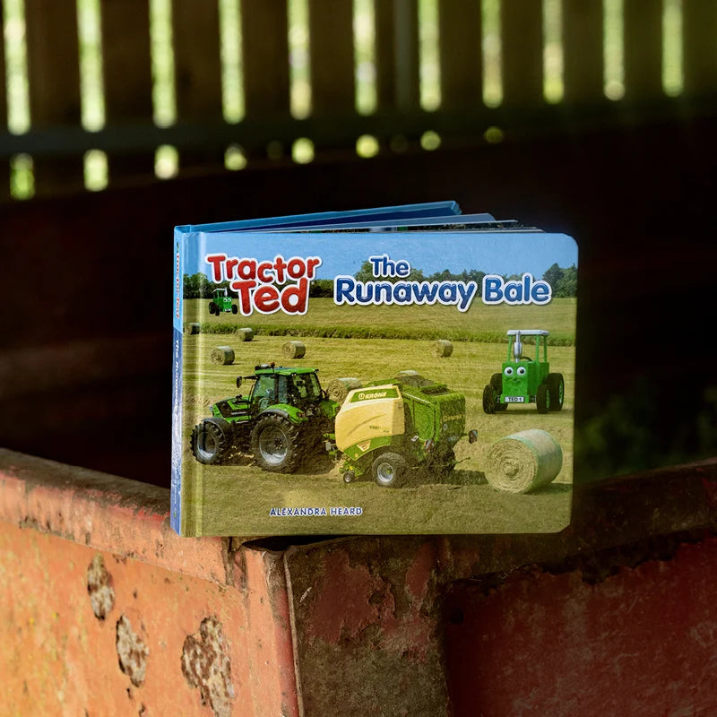 Tractor Ted The Runaway Bale children's story board book showing colorful farmyard illustrations