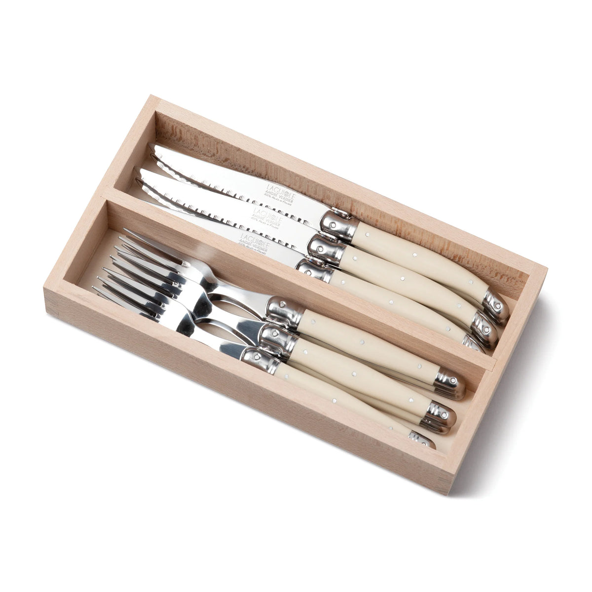 André Verdier Laguiole 12 piece stainless steel steak knife and fork set in a wooden presentation tray, in Ivory Cream