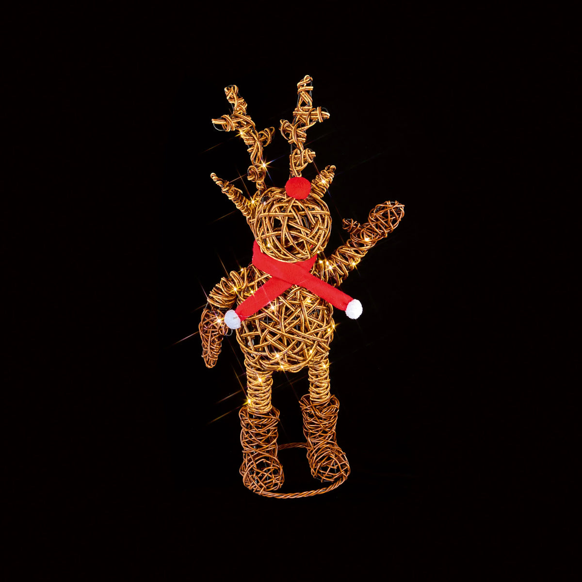 Premier 60cm woven rattan look reindeer in red boots illuminated by 60 warm white LEDs