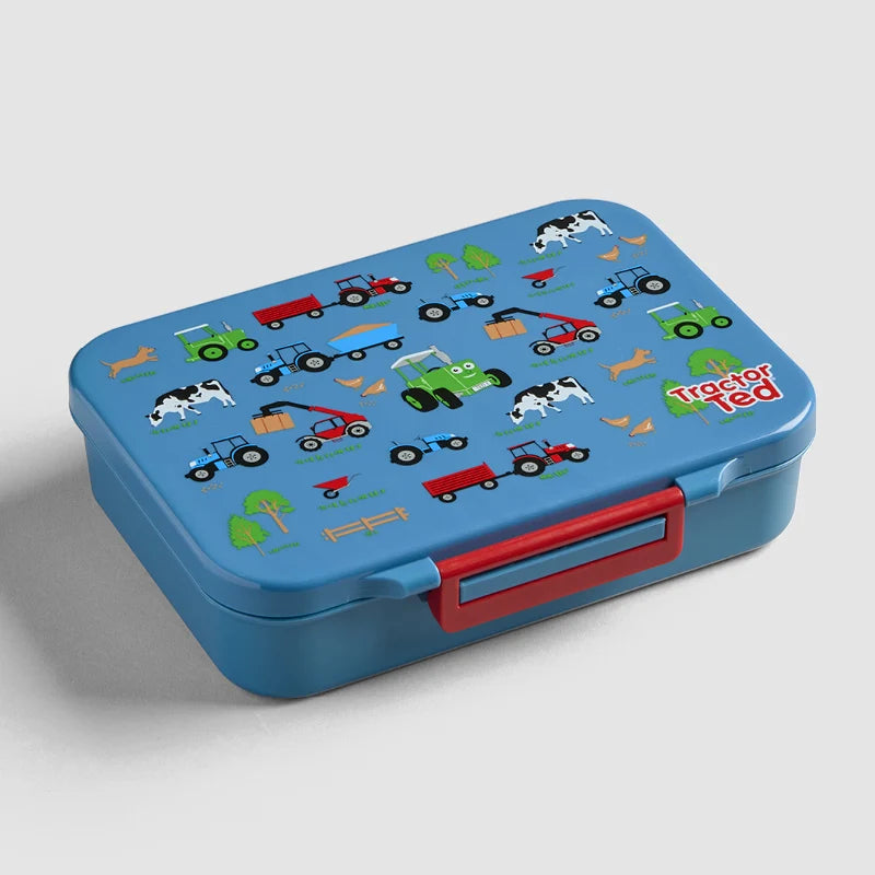 Tractor Ted Farmyard Lunch Box featuring green farm machinery graphics on the front lid<