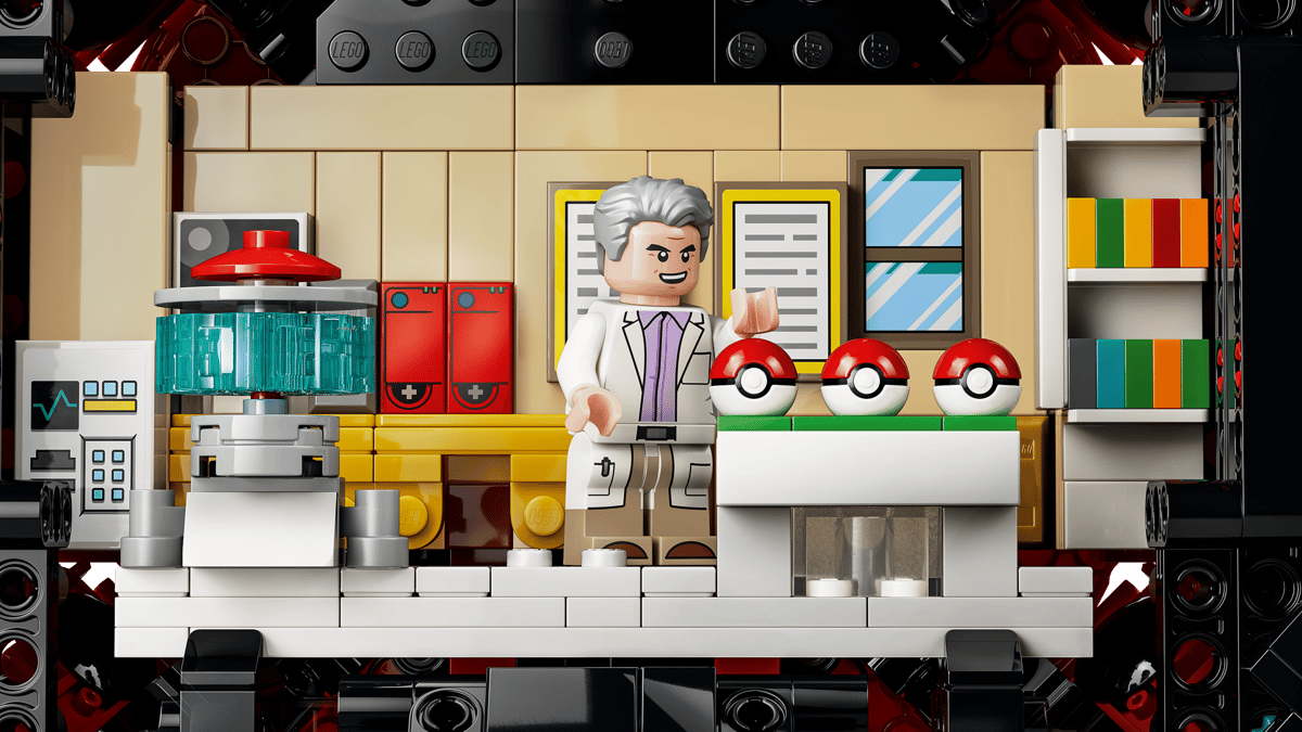 LEGO Pokémon Iconic Trainer Moments Poké Ball 72154 opened to display Professor Oak laboratory and battle scenes inside.