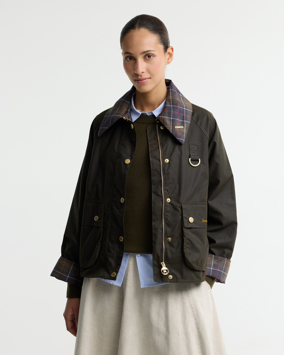 Barbour Womens Icons Tartan Collar Spey Waxed Jacket in 6oz waxed cotton, featuring front patch pockets, brass studs and a classic cord collar.