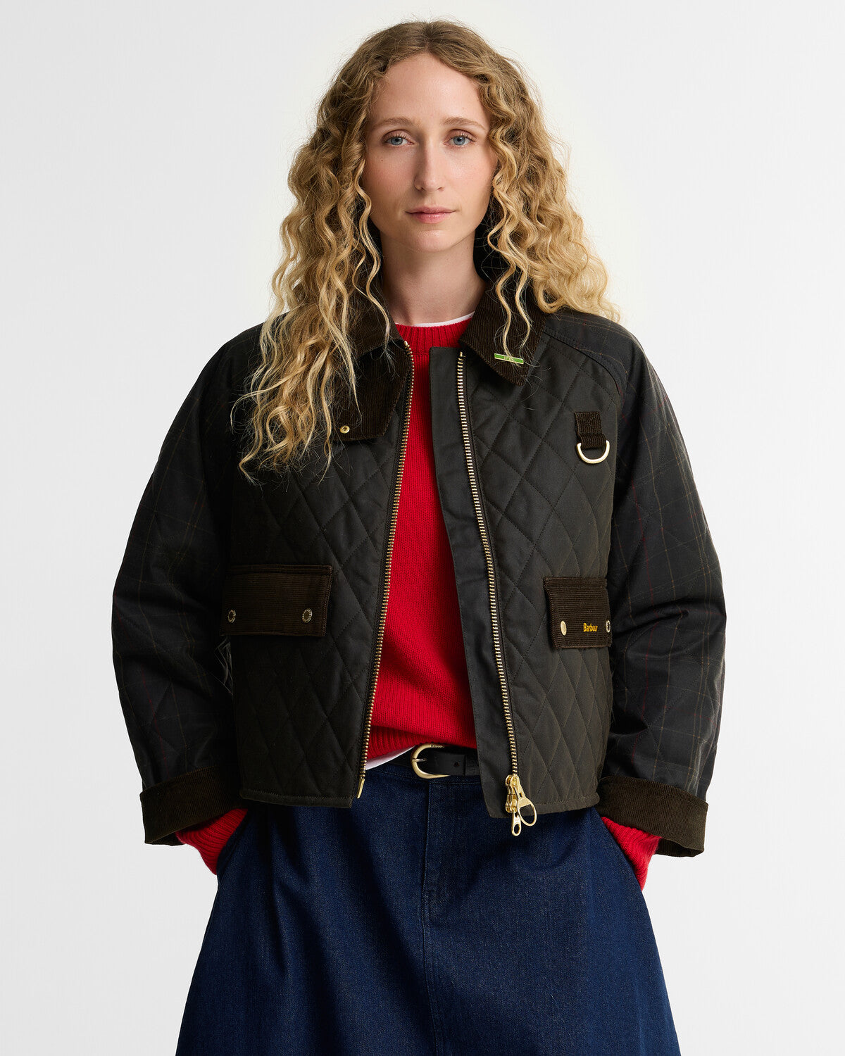 Womens Barbour Icons Tartan Quilted Spey Wax Jacket in olive green, featuring a corduroy collar, classic D-ring detail and front pockets.