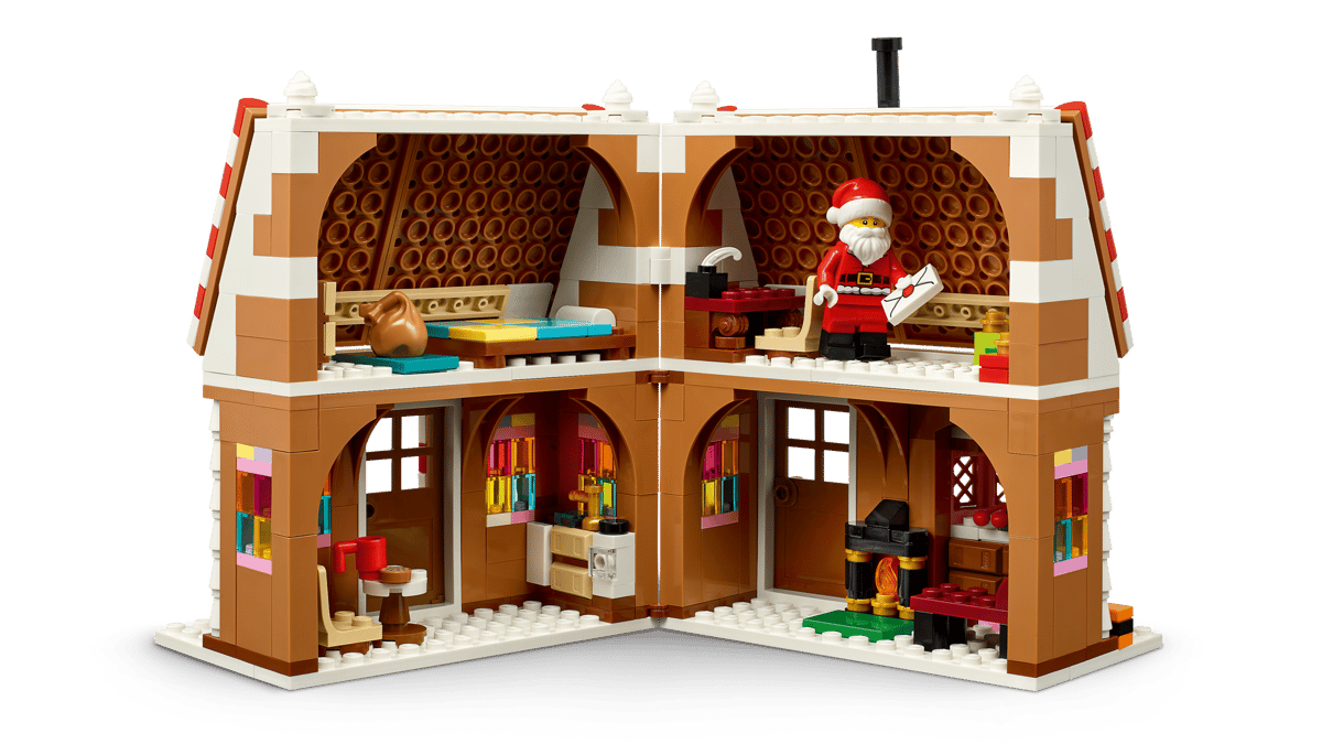 LEGO Festive Gingerbread House 40809 shown built alongside a Santa Claus minifigure.