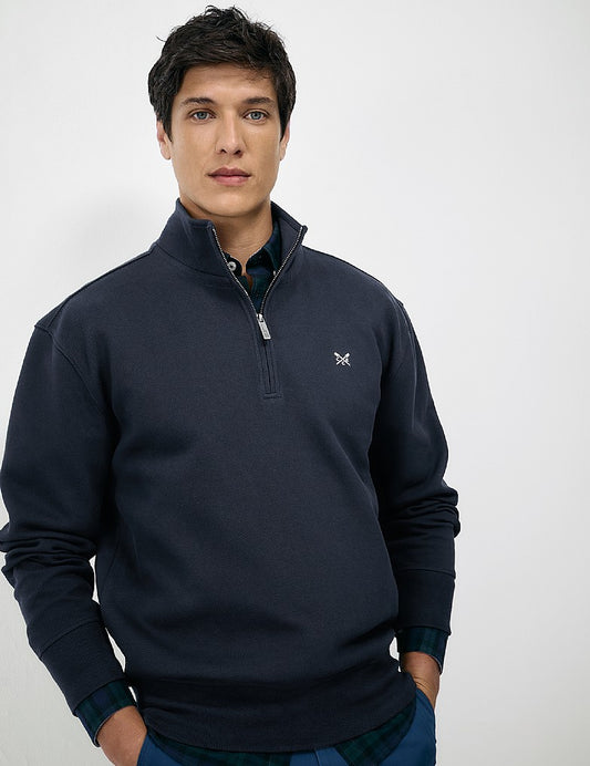 Men's Crew Clothing navy pique half-zip sweatshirt featuring a ribbed collar and embroidered logo at the hem.