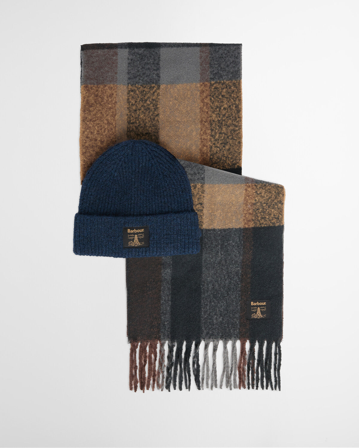 Barbour Westerdale Beanie and Scarf Gift Set featuring a supersoft marl yarn hat and a matching boucle check scarf with a tasselled hem.