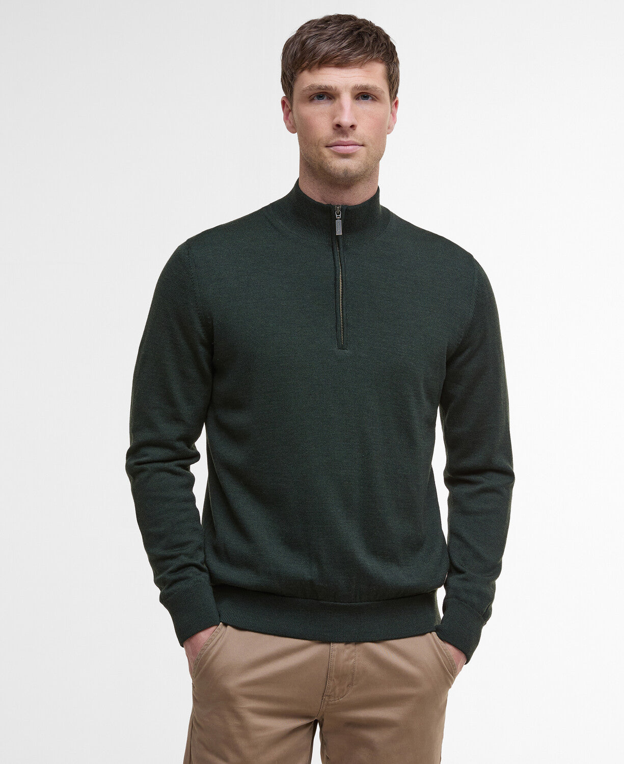 Barbour Gamlan waterproof merino wool jumper with a zipped stand collar and a discreet chest badge.