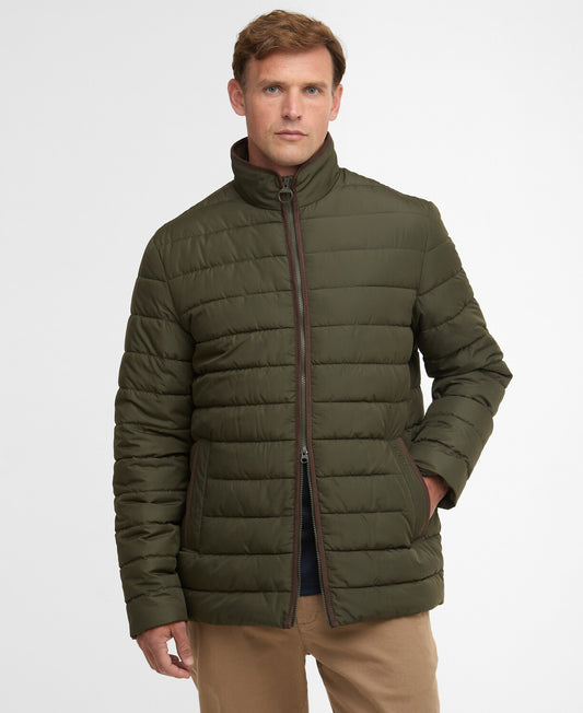 Man wearing an olive green Barbour Broughton baffle quilted jacket with microfibre trims and subtle front pocket embroidery.