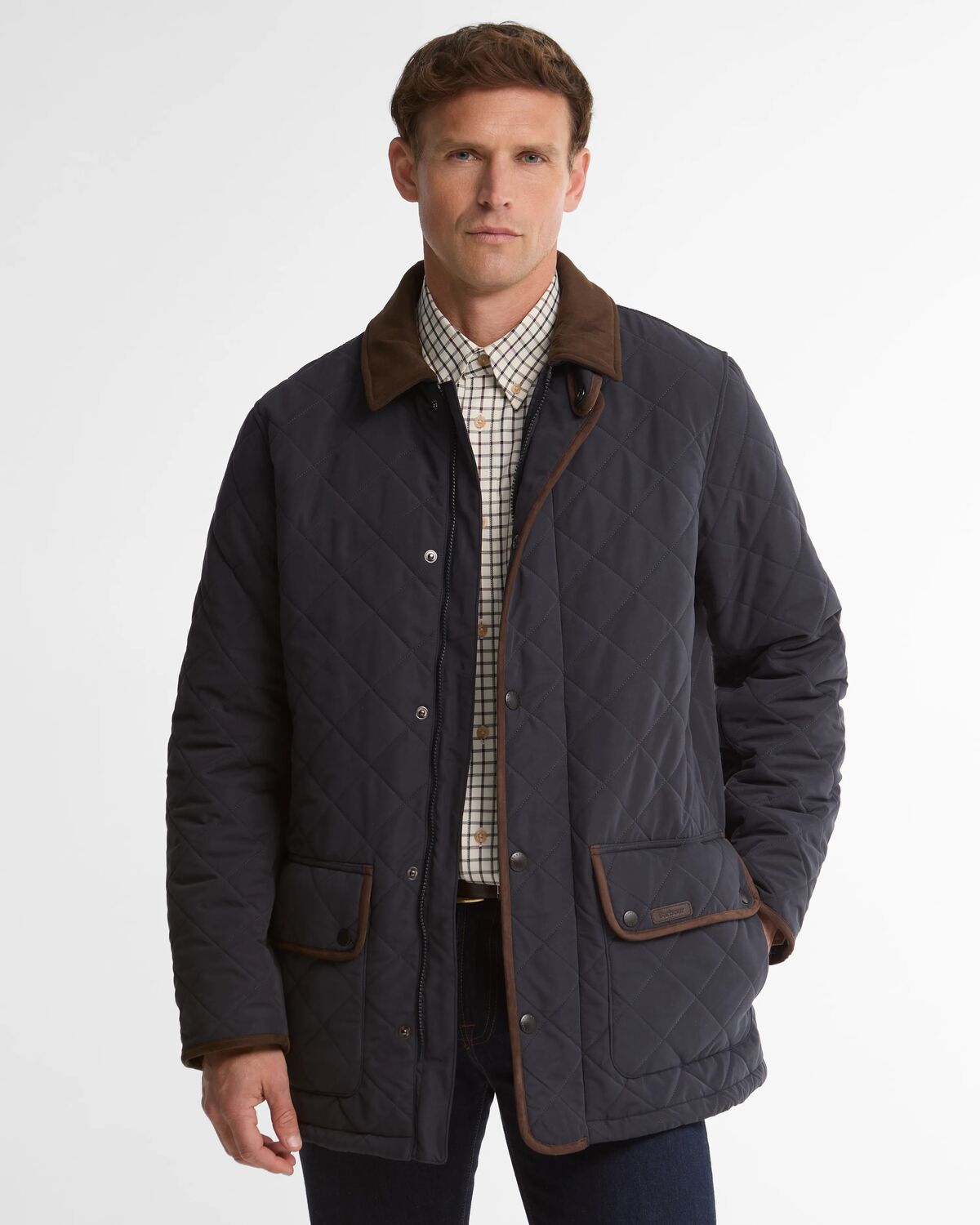 Barbour Thursby Polarquilt Men's Quilted Jacket featuring a faux chamois collar, gold tone buttons, and a fleece lining.