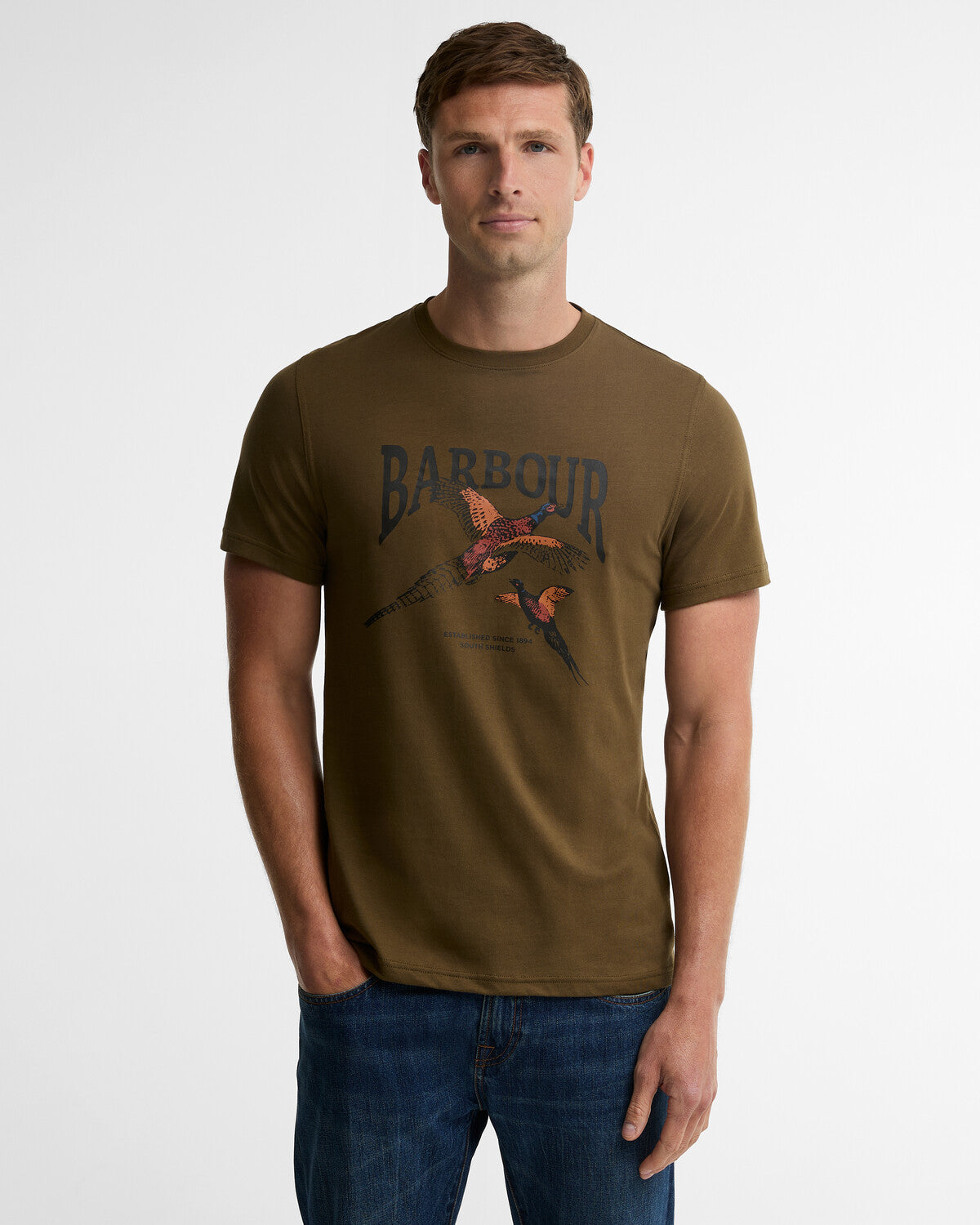 Man wearing a Barbour cotton t-shirt featuring a large graphic print of a pheasant on the front chest.