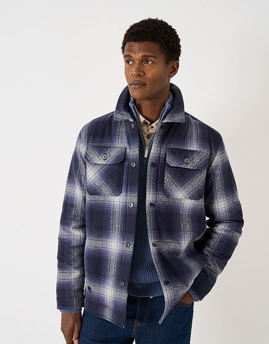 Crew Clothing Borg Lined Check Flannel Shacket featuring a heritage check pattern, cosy borg lining, chest pockets, and branded metal buttons.