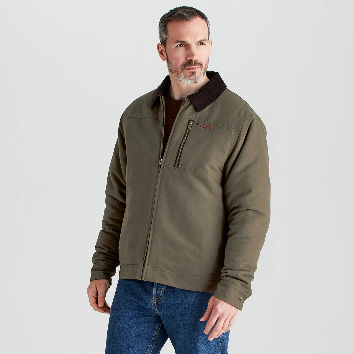 Ridgeline Men's Montana Work Coat in brown featuring a corduroy collar and zipped chest pocket.