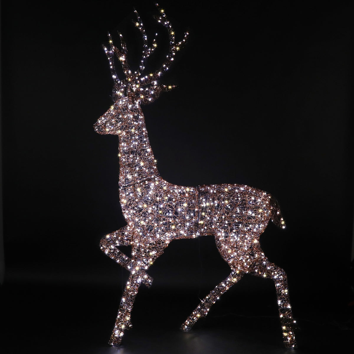 NOMA 2m copper acrylic Highland stag with branch antlers glowing with bright LEDs in the dark.