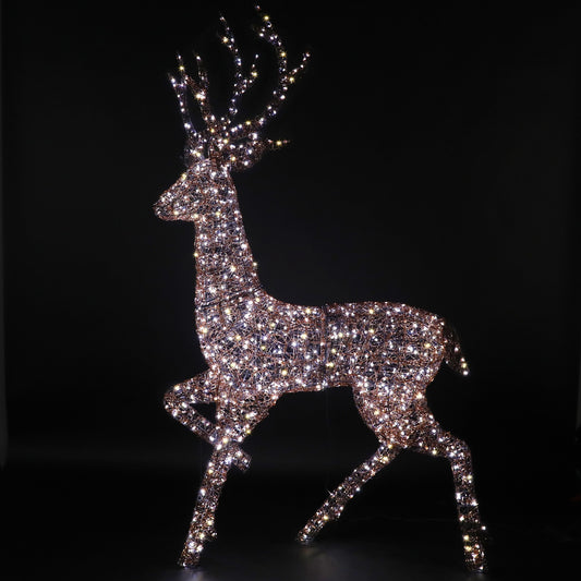 NOMA 2m copper acrylic Highland stag with branch antlers glowing with bright LEDs in the dark.