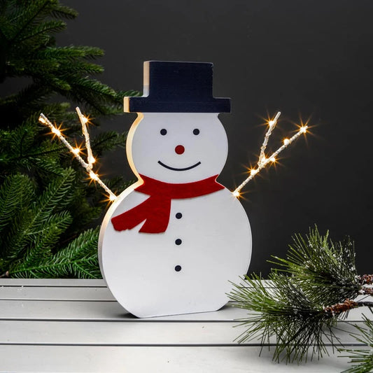 Brighten your indoor holiday home with the NOMA 30cm Wooden Snowman decoration. Features 14 warm white micro wire LEDs and battery operation.