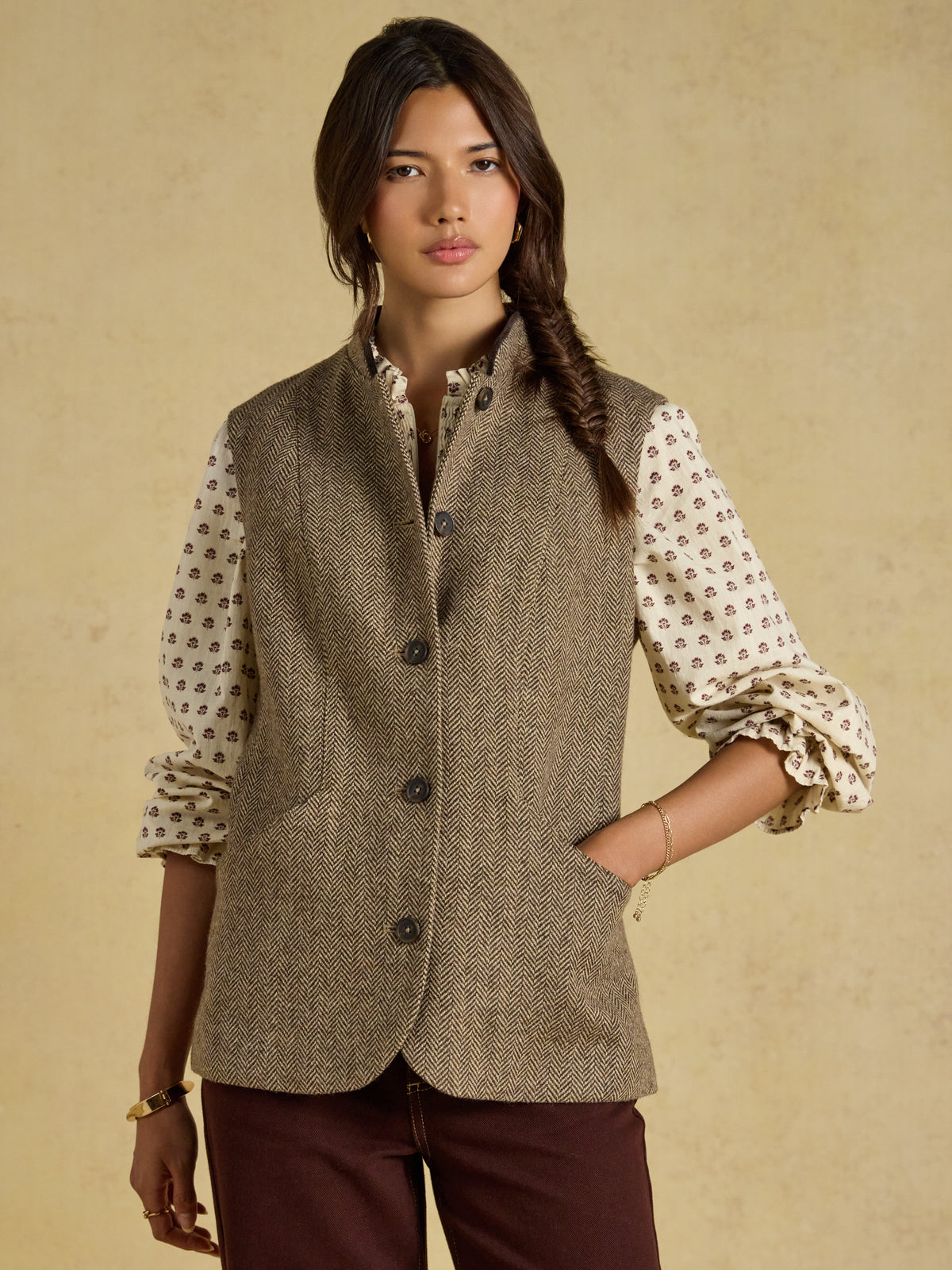 Joules Womens Wool Blend Nehru Collar Tweed Gilet in linear herringbone pattern.