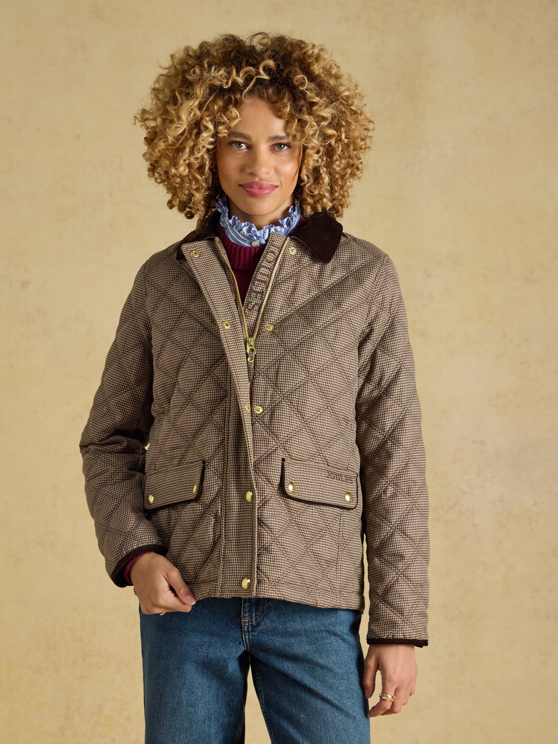 Front view of the Joules Women's Harrogate Diamond Quilted Jacket featuring a corduroy collar and slant pockets.