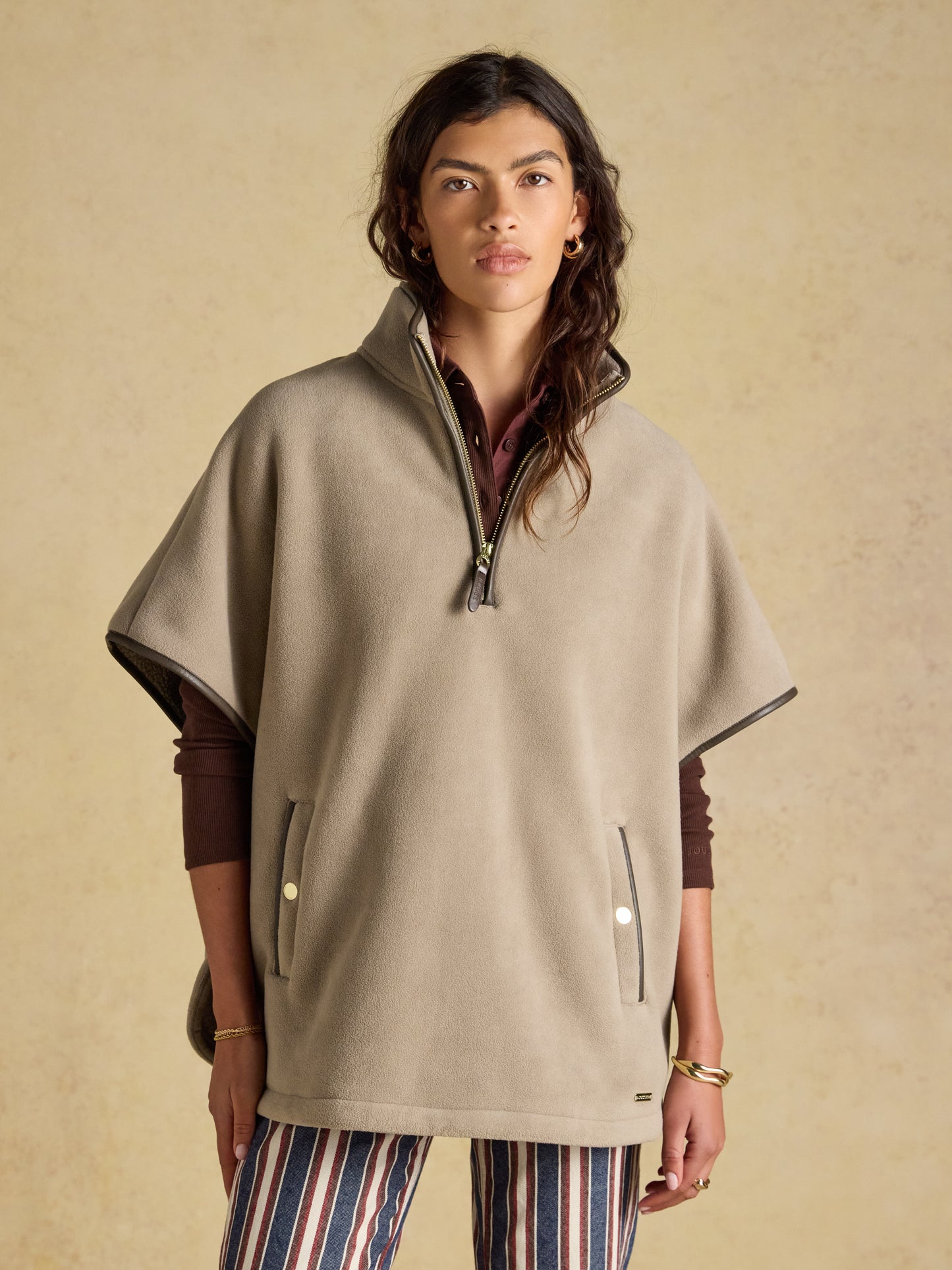 Joules Heritage Polar Fleece Short Cape in soft thermal fleece with faux-leather trim and quarter-zip neck.