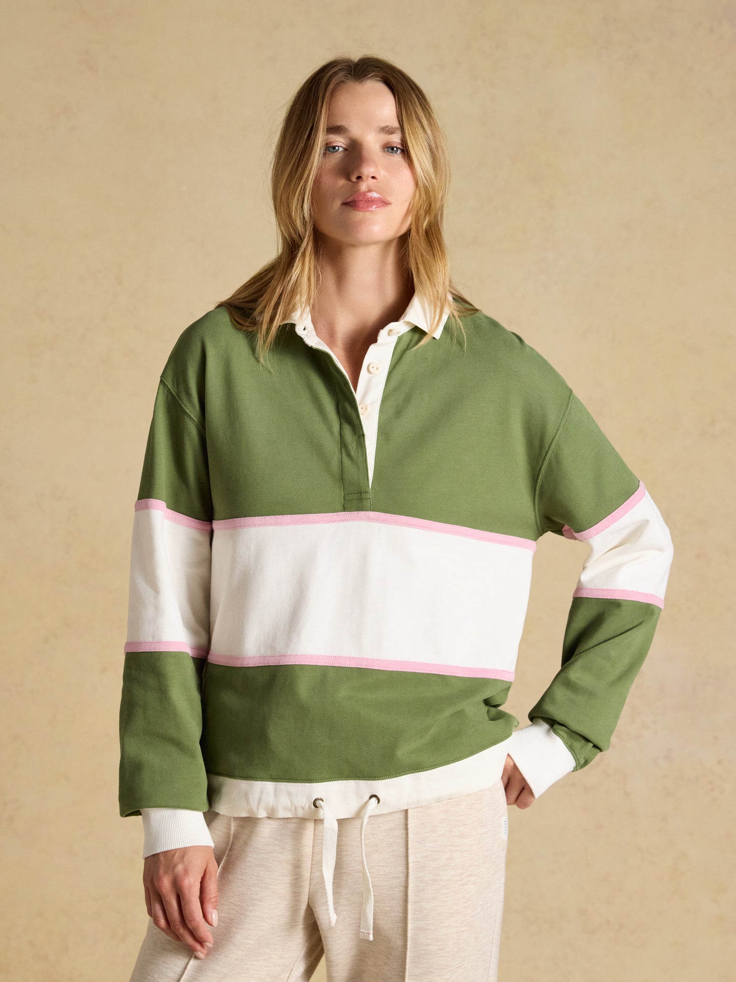 Woman wearing a Joules long sleeve hotchpotch cotton rugby deckshirt with a white twill collar